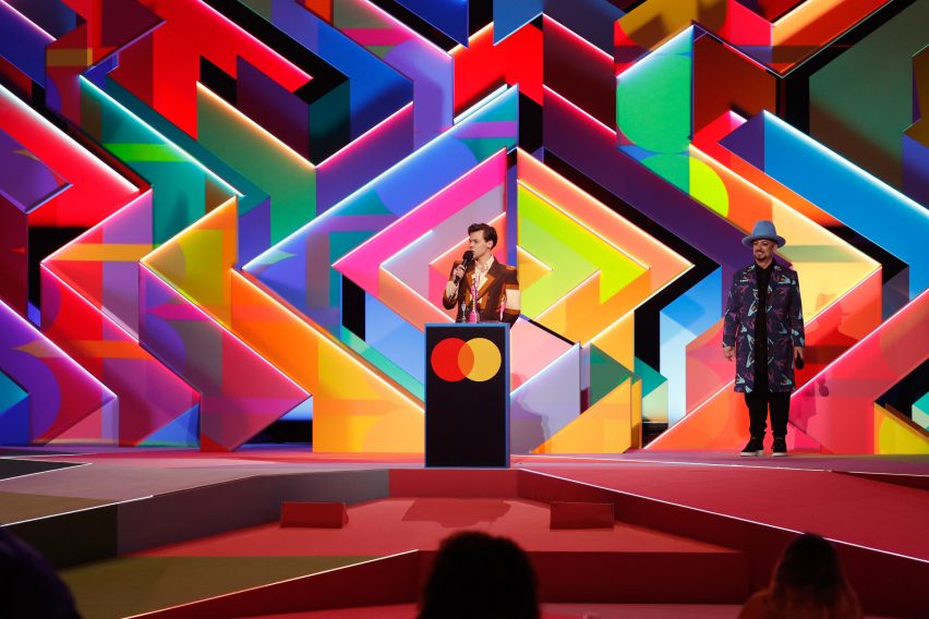 Harry Styles in front of Es Devlin's set design for Brit Awards 2021