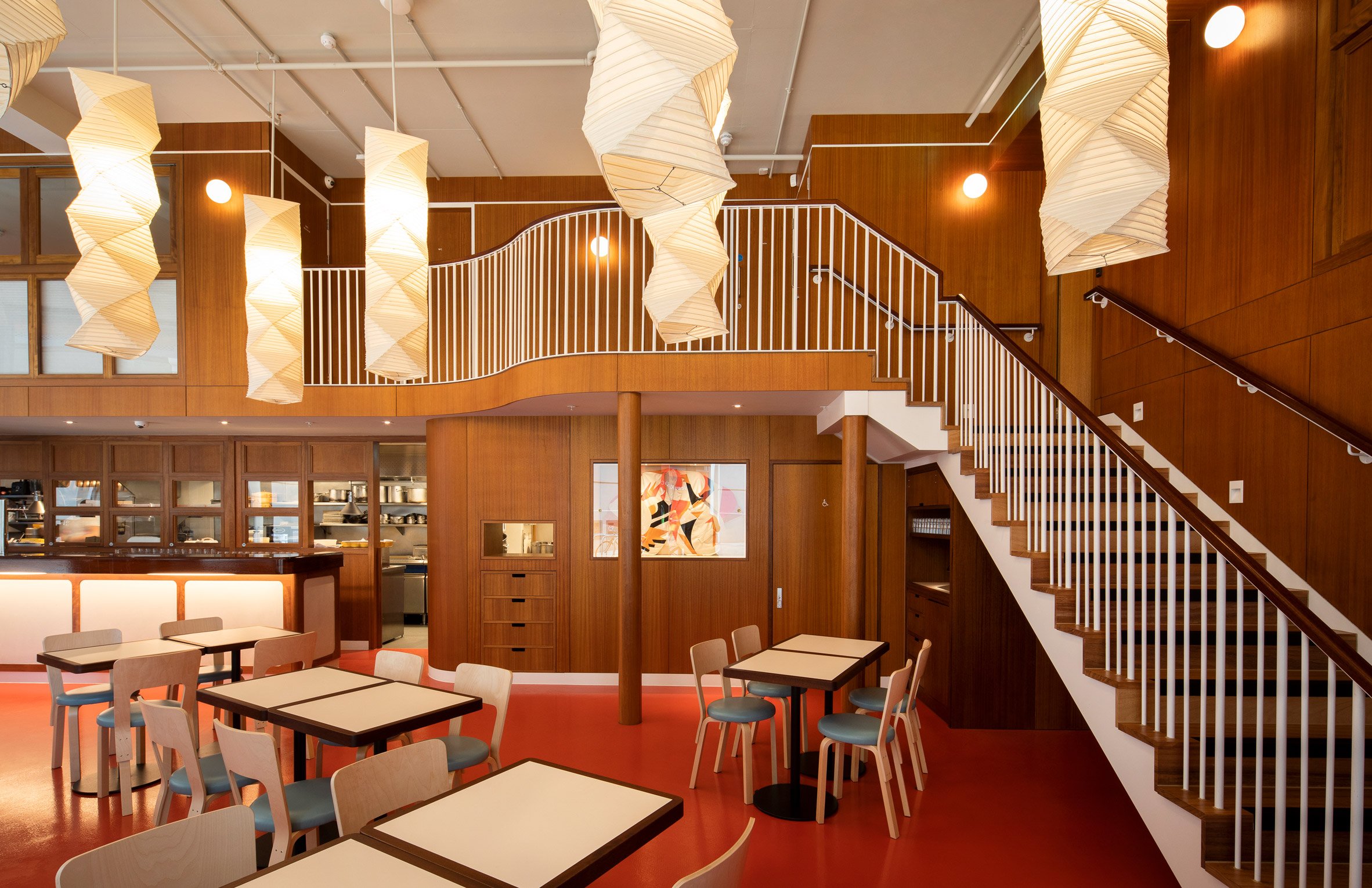 Interior of Cafe Bao with wood-panelled mezzanine