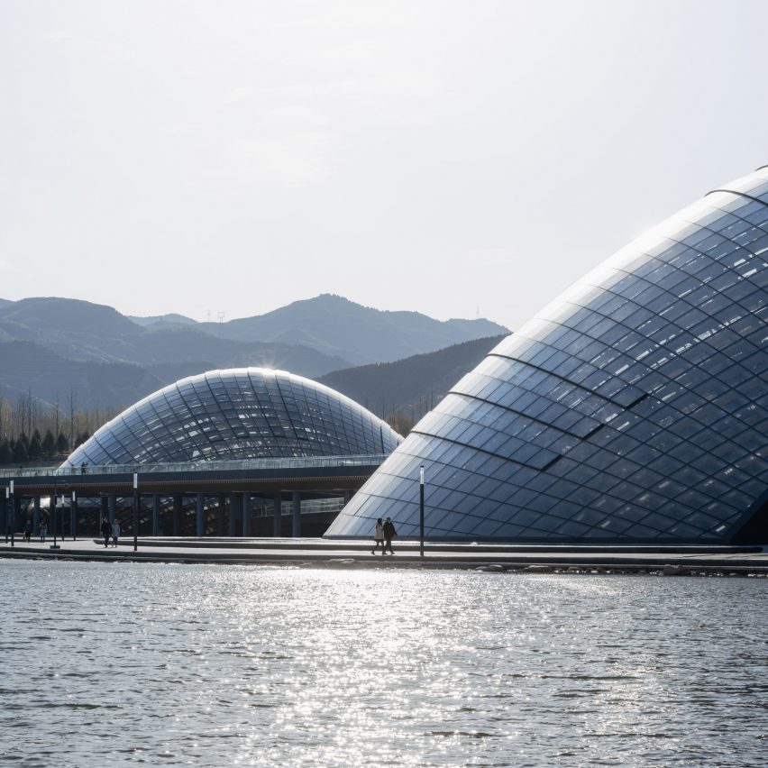 Domed greenhouses were built by an artificial lake