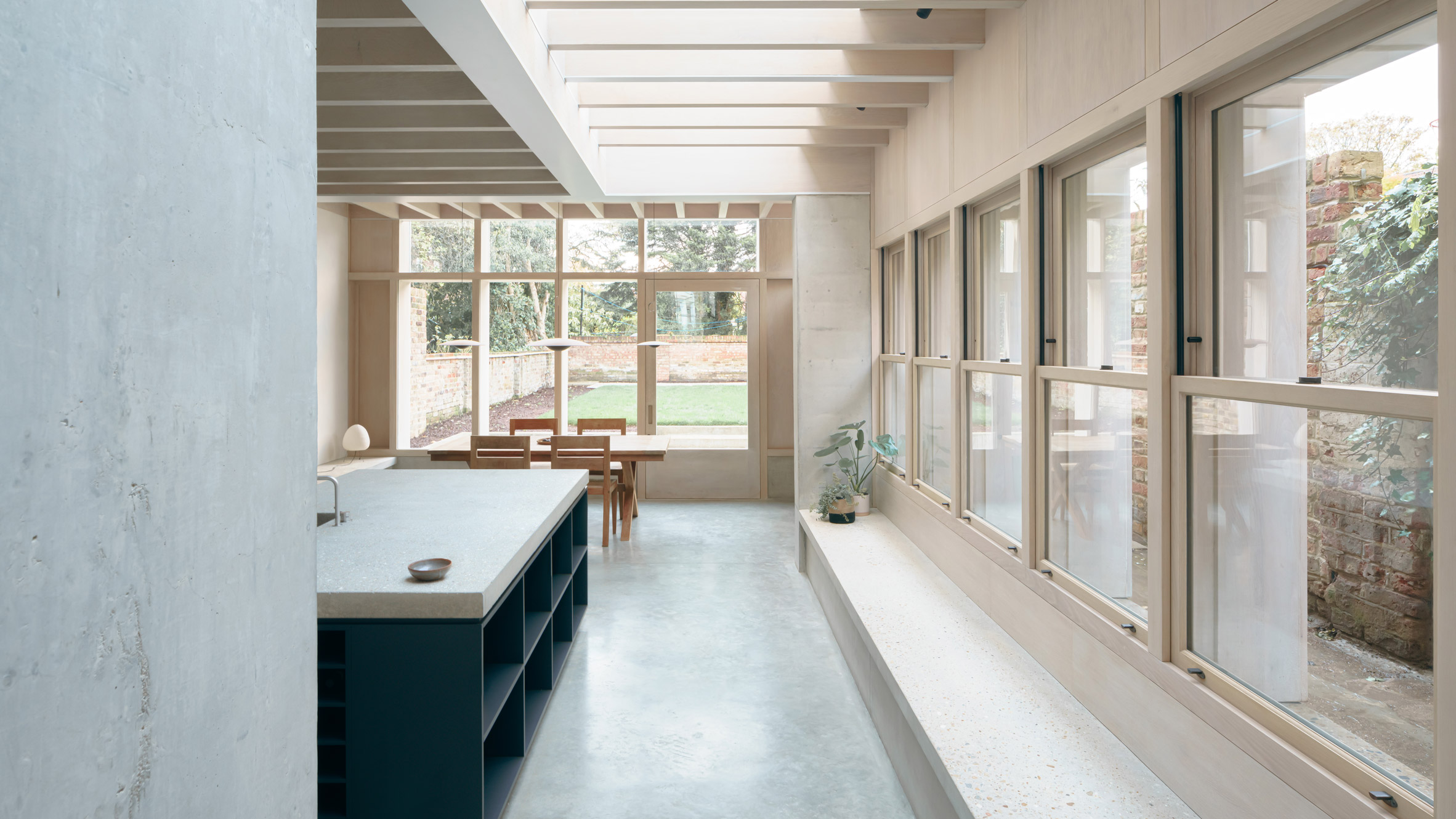 Sunken concrete floor expands Victorian terrace house in London - Vimarsana News