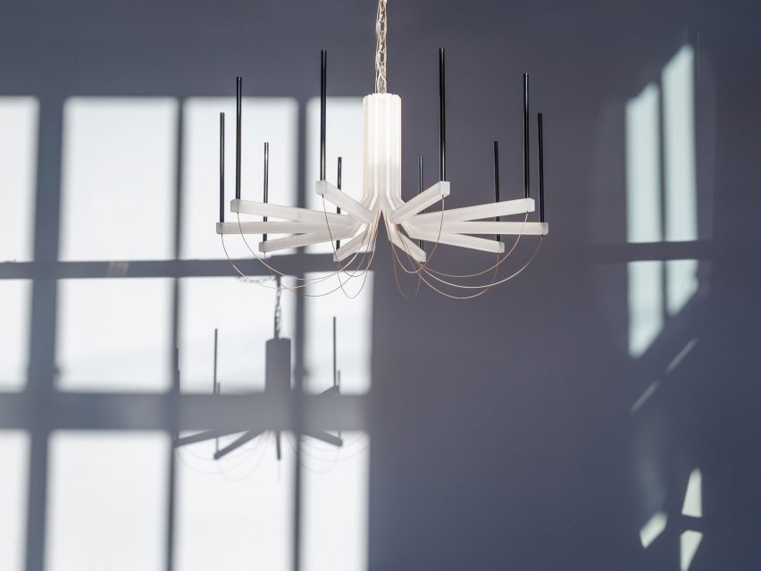 The chandelier takes cues from traditional chandeliers