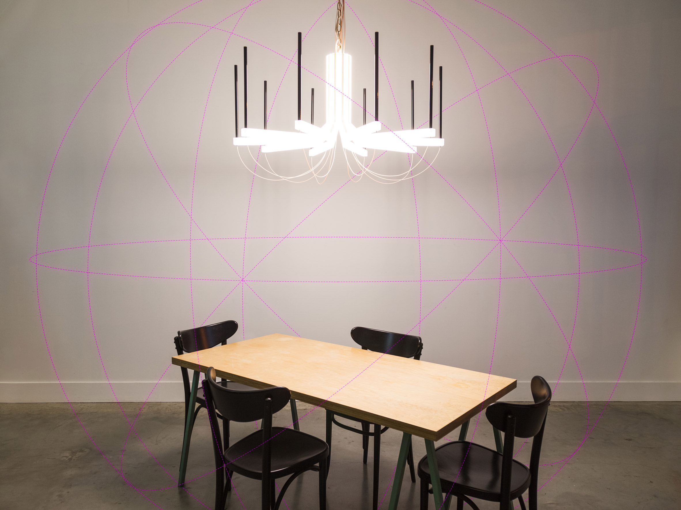The chandelier is designed as a tech-free zone