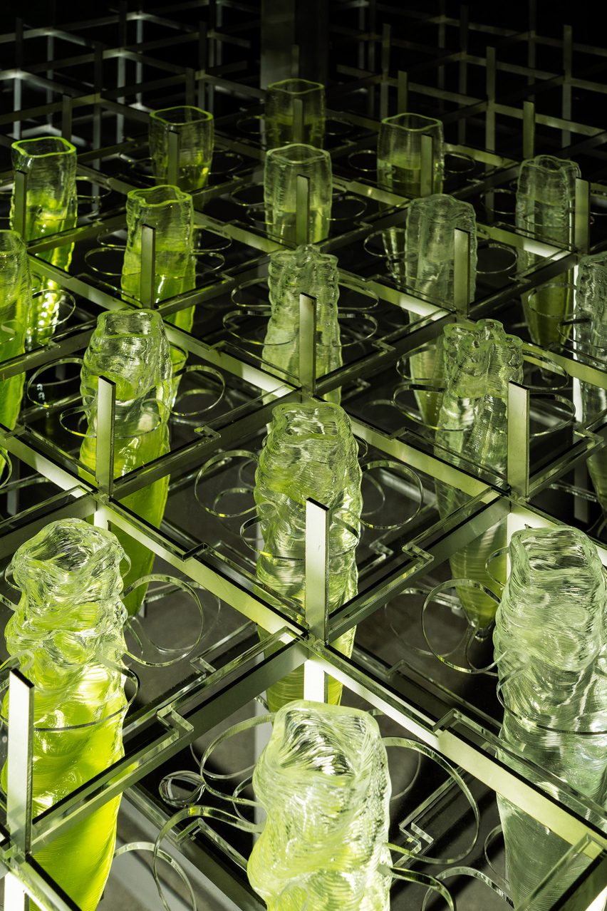 3D printed Swarovski crystal vessels full of green biogel