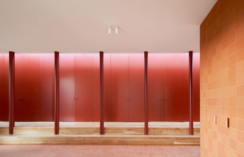 Red doors in House in Sant Antoni de Vilamajor by Arquitectura-G