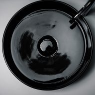 A circular black sink