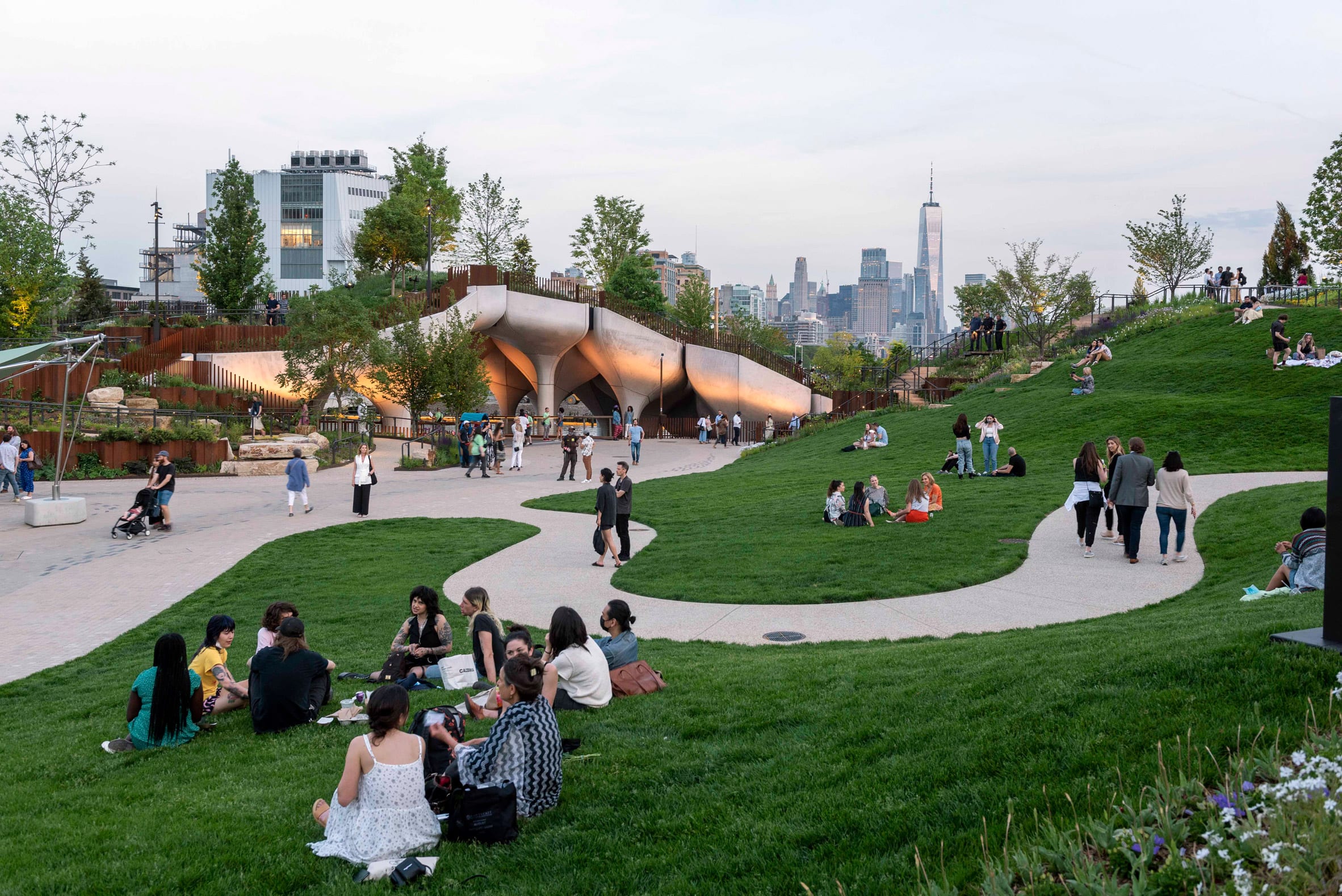 People on the grass of a new park in New York