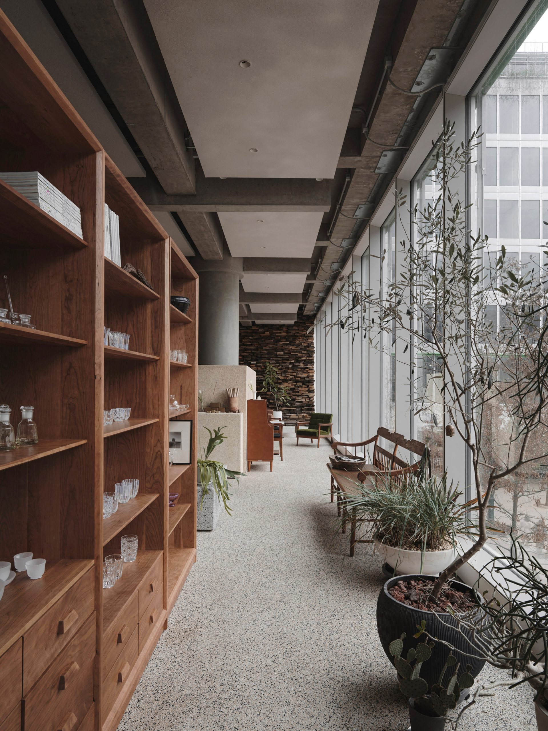 Wooden shelving and benches in Lost & Found Hangzhou store