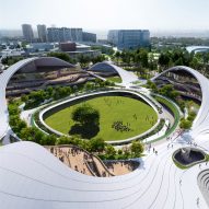 MAD tops Jiaxing Civic Center with roof shaped like a "tarp blown by the wind"