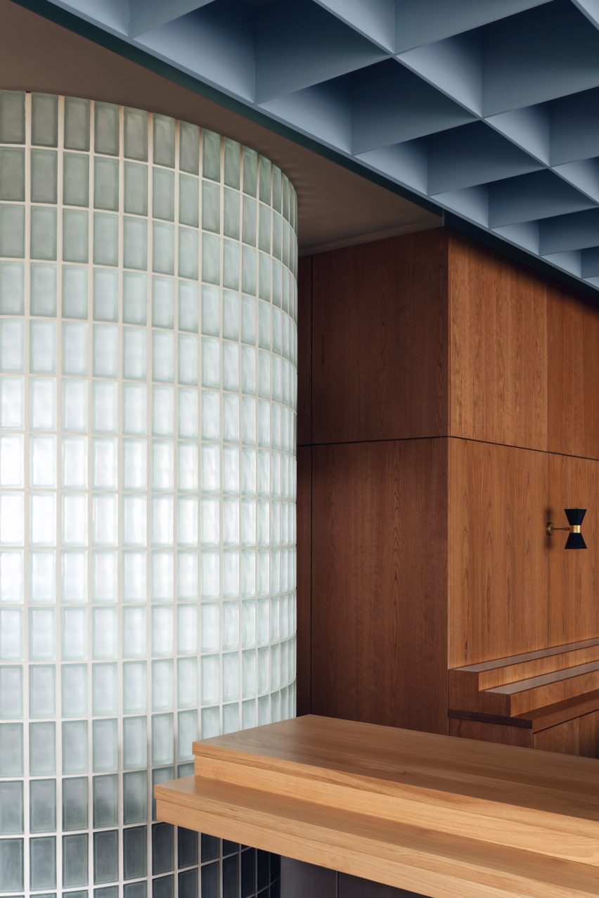 Glass blcok wall and wooden cupboard in Maido restaurant