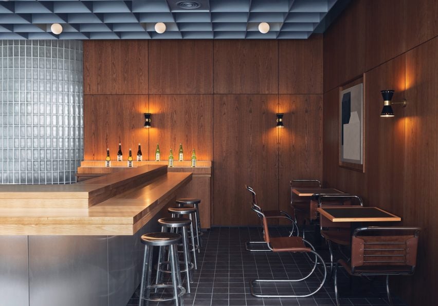 Steel panelled bar and MR10 tubular steel chairs by Mies van der Rohe chairs in restaurant interior by Child Studio
