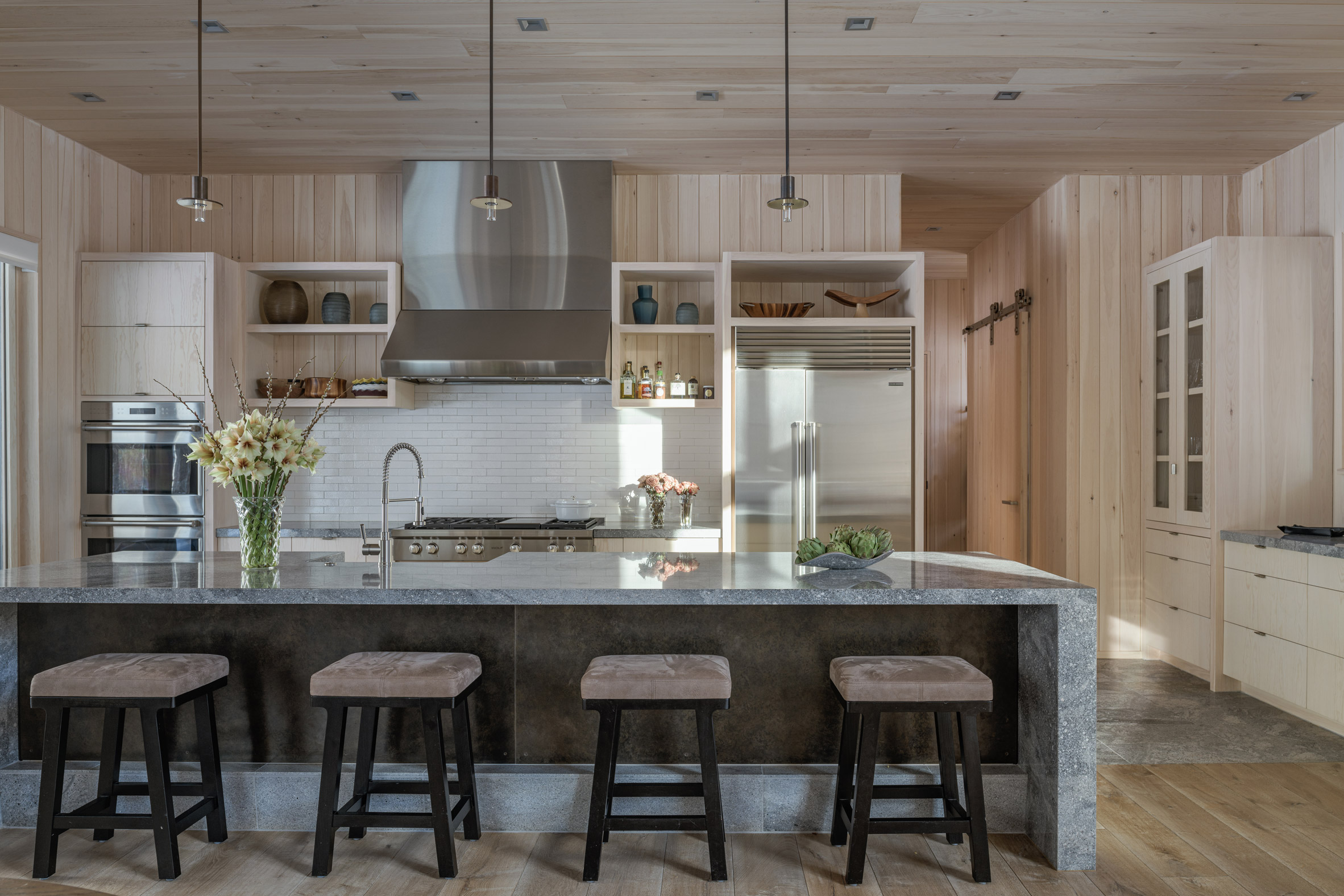 The team used earthy materials in the kitchen