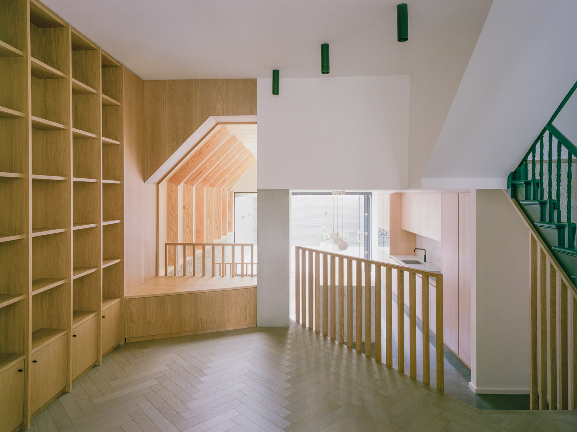Matthew Giles Architects inserted a reading nook into the ground floor