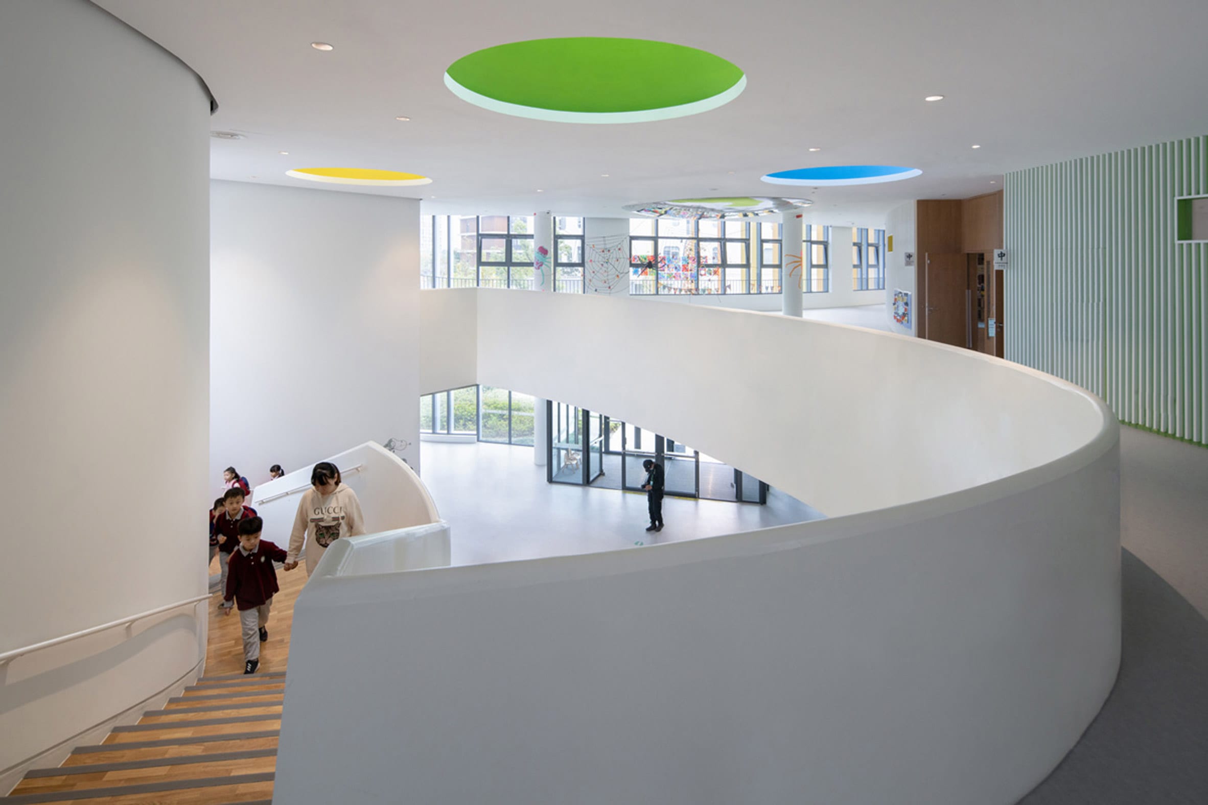 Kindergarten at Gym Canteen at Shanghai Qingpu Pinghe International School by Open Architecture