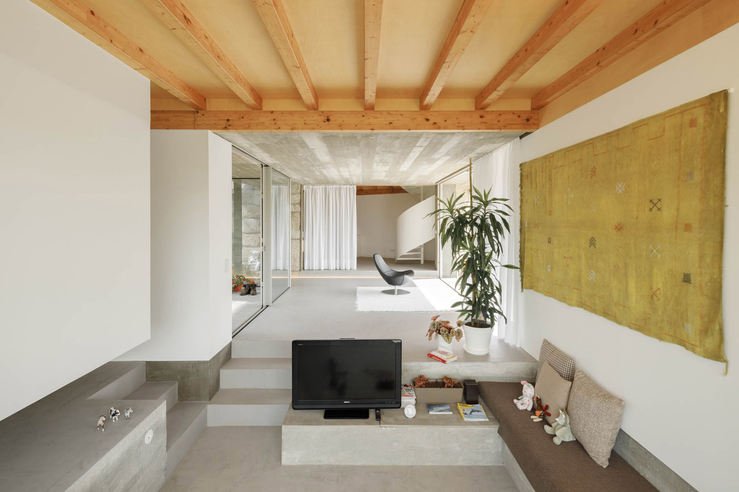 Light wood lines the ceiling of the living areas at Casa Rio