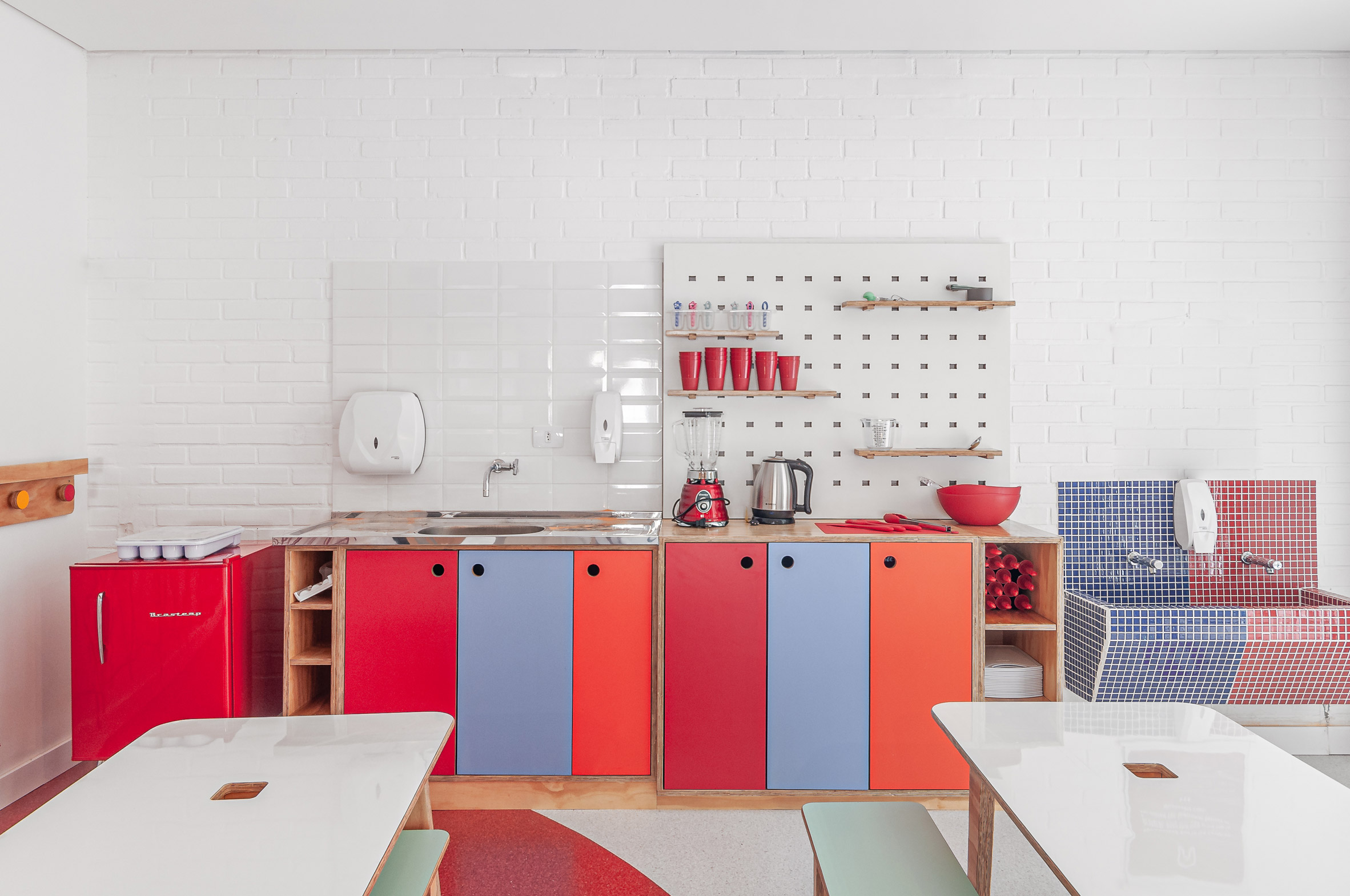 Bright cabinets line the classrooms
