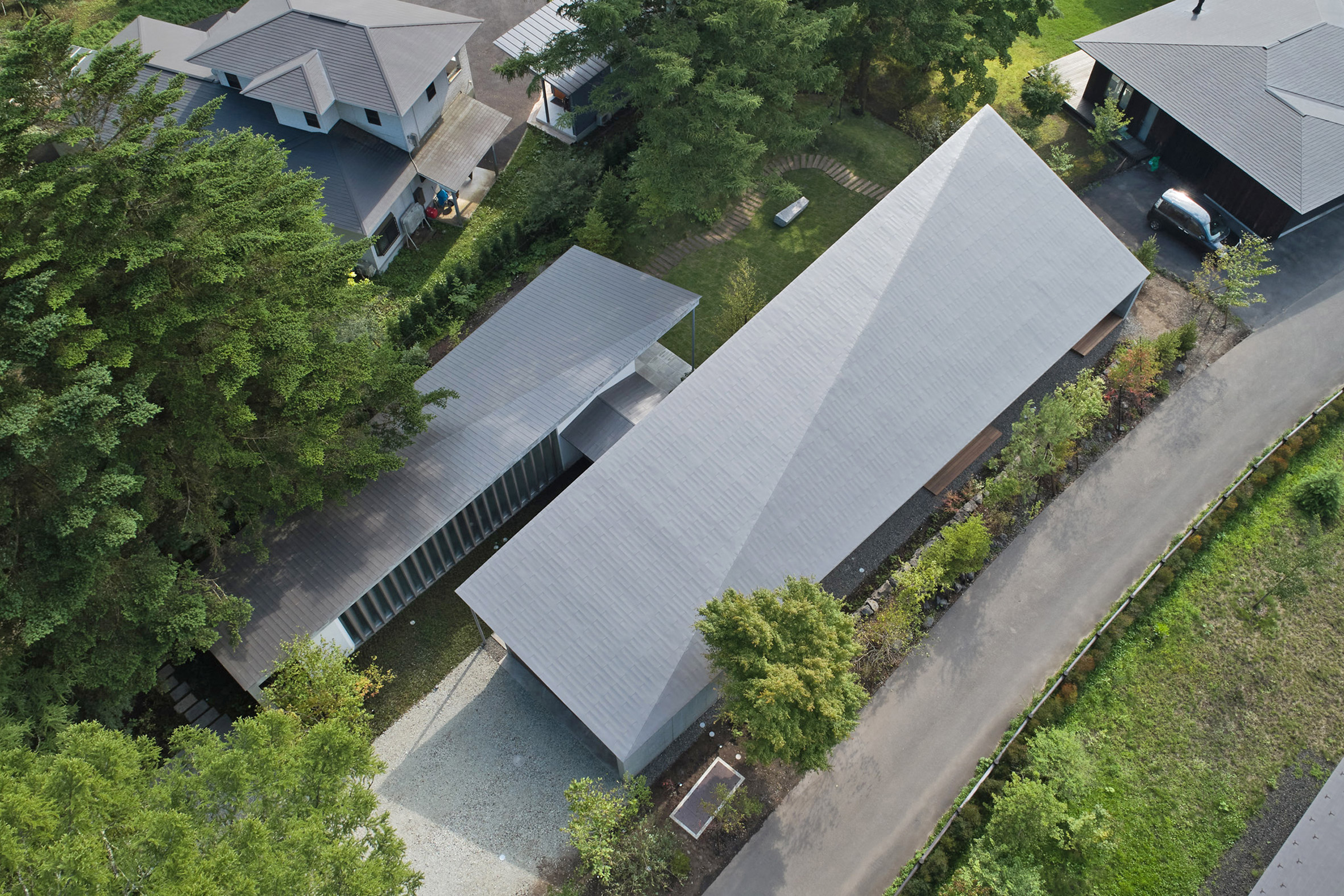 Roofs of Symbiotic House for Life After Retirement by READ & Architects