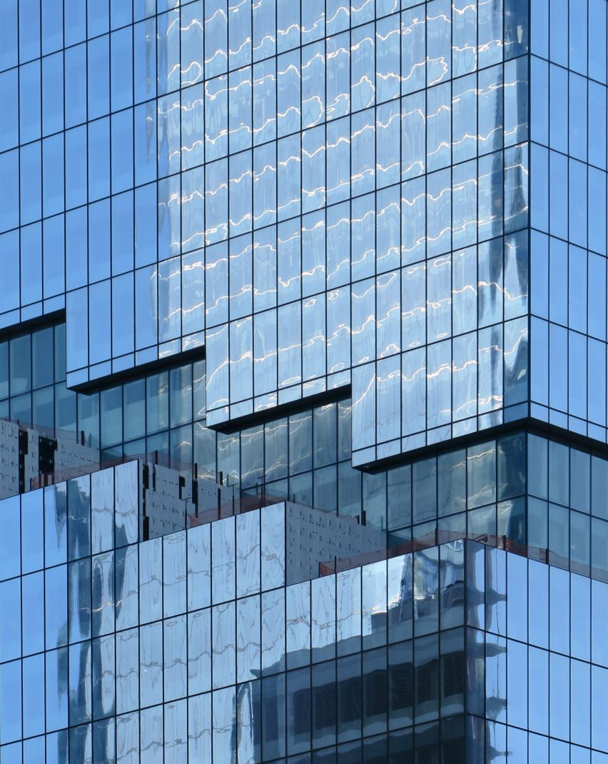 Glass zigzag down the side of a supertall skyscraper in New York