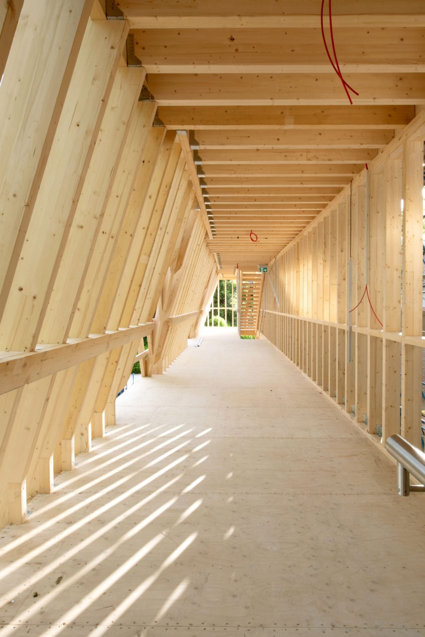 The US pavilion contrasts with its wooden installation