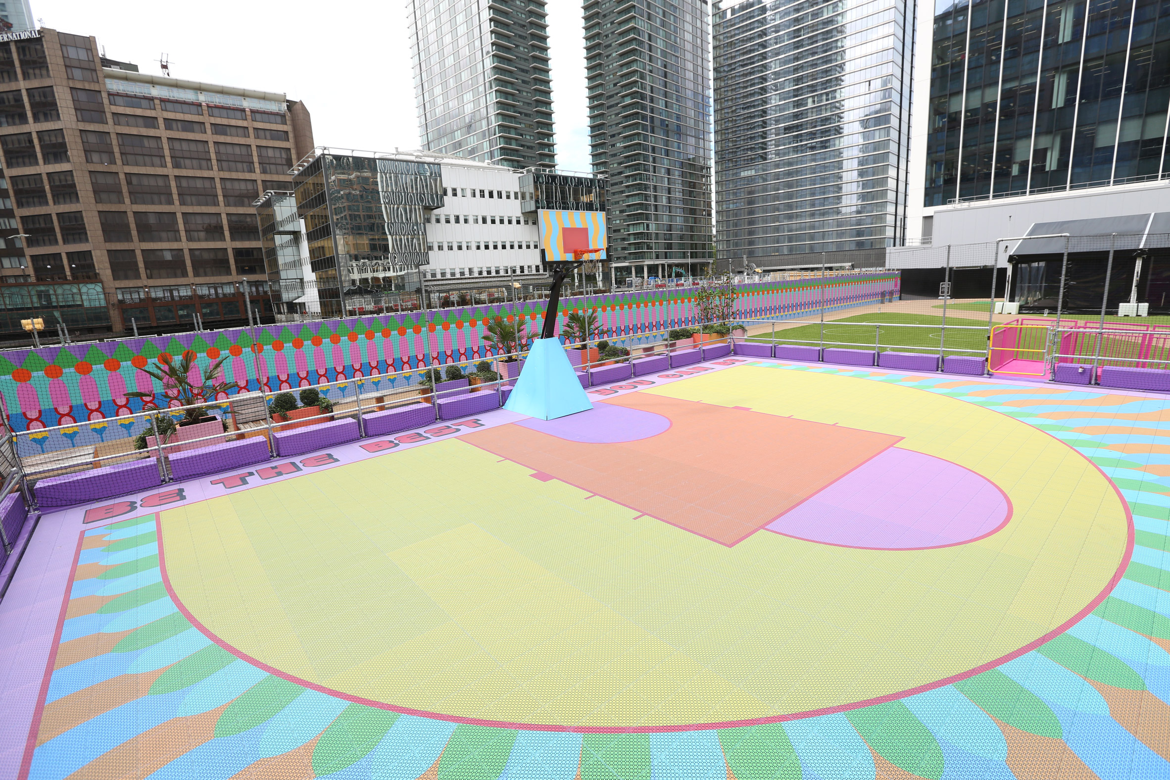 Aerial view of colourful Canary Wharf basketball court