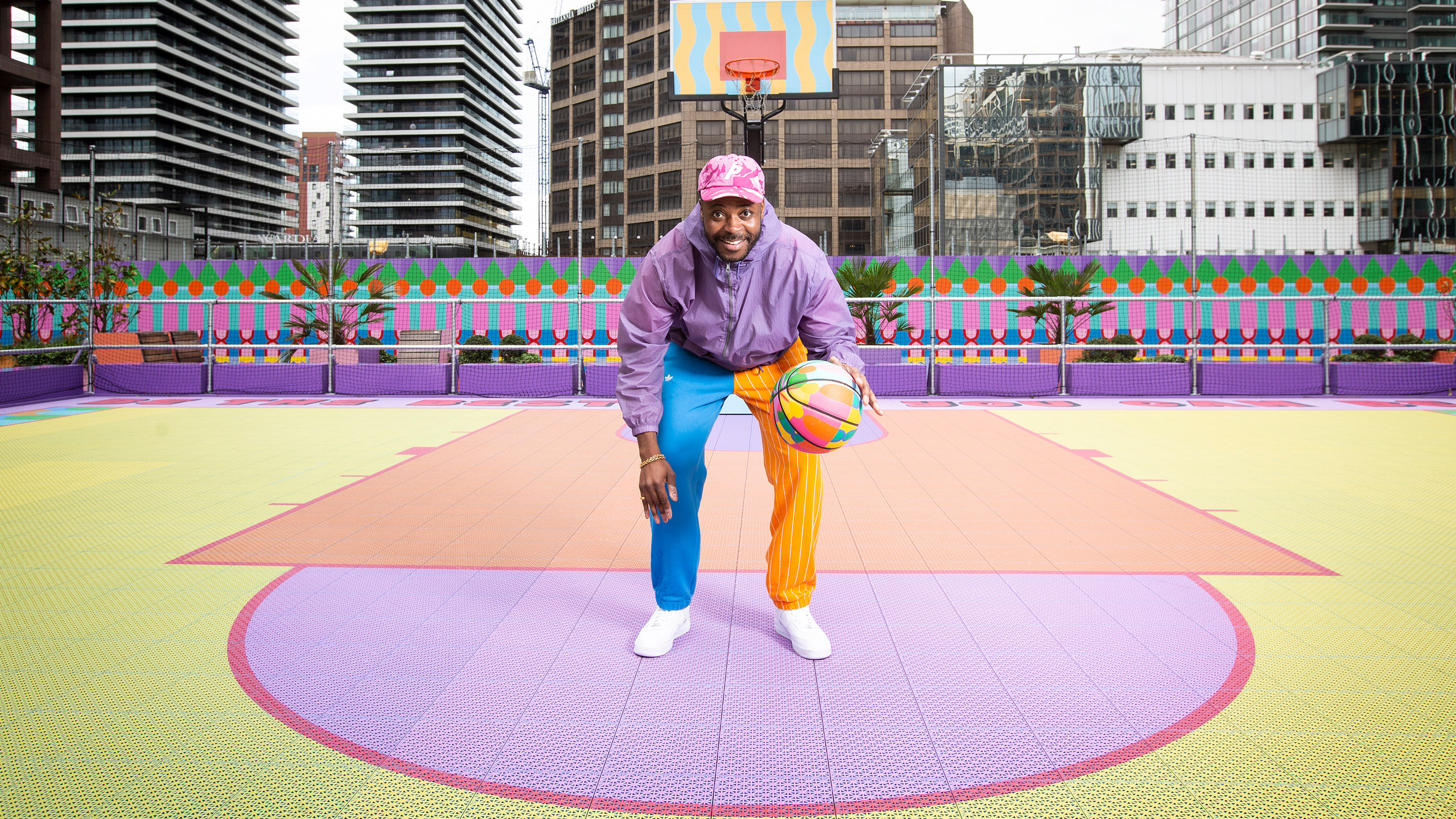 Yinka Ilori 3D prints Canary Wharf basketball court in rainbow colours