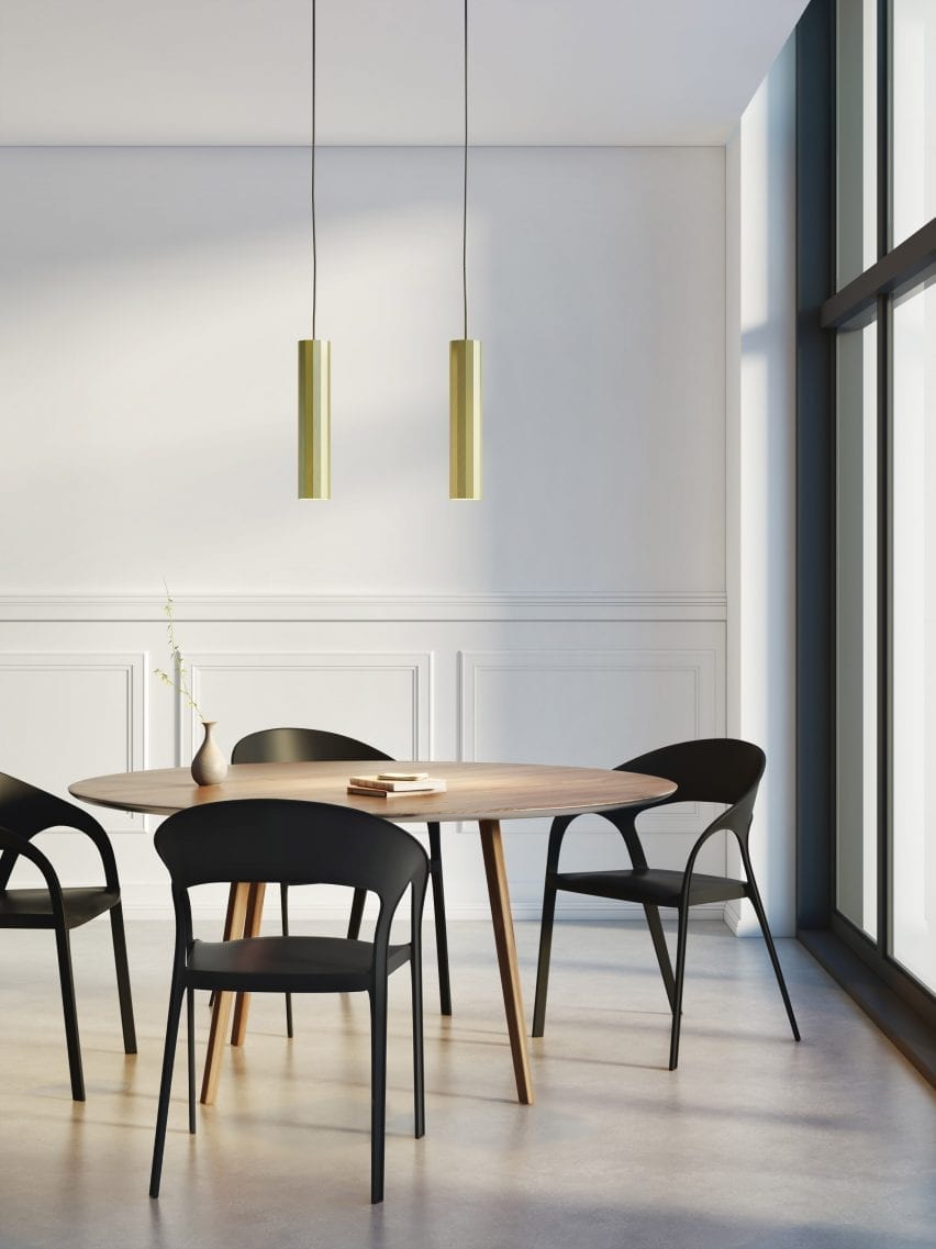 Hashira pendant lights by Astro Lighting suspended above a dining table