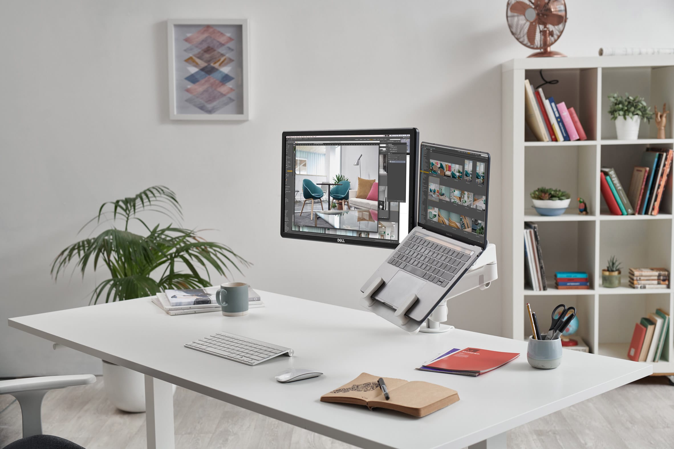 Colebrook Bosson Saunders' monitor arm and laptop mount secured to a desk