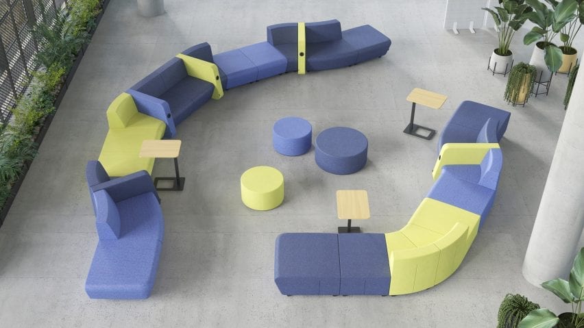 Elaborate arrangement of modular seating with screen dividers, side tables and in-built chargers