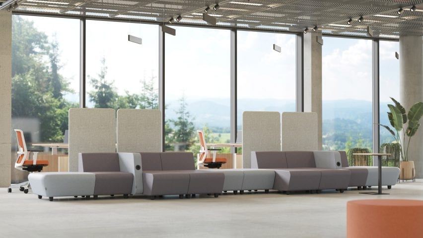Grey modular seating situated in an office environment