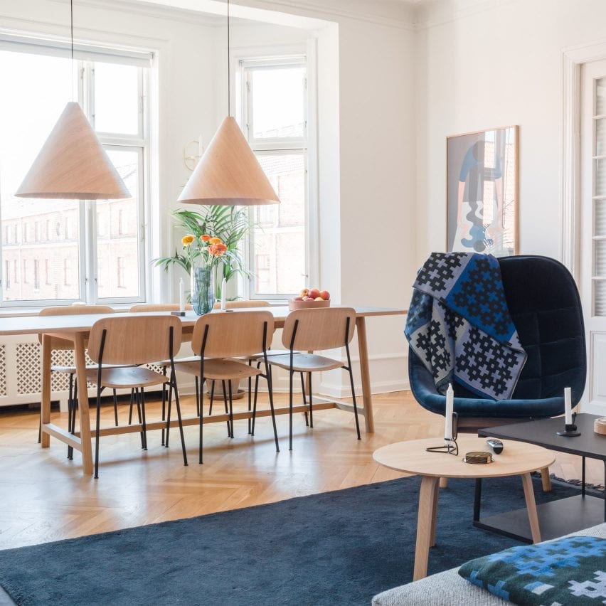 A co-living space with a large dining table