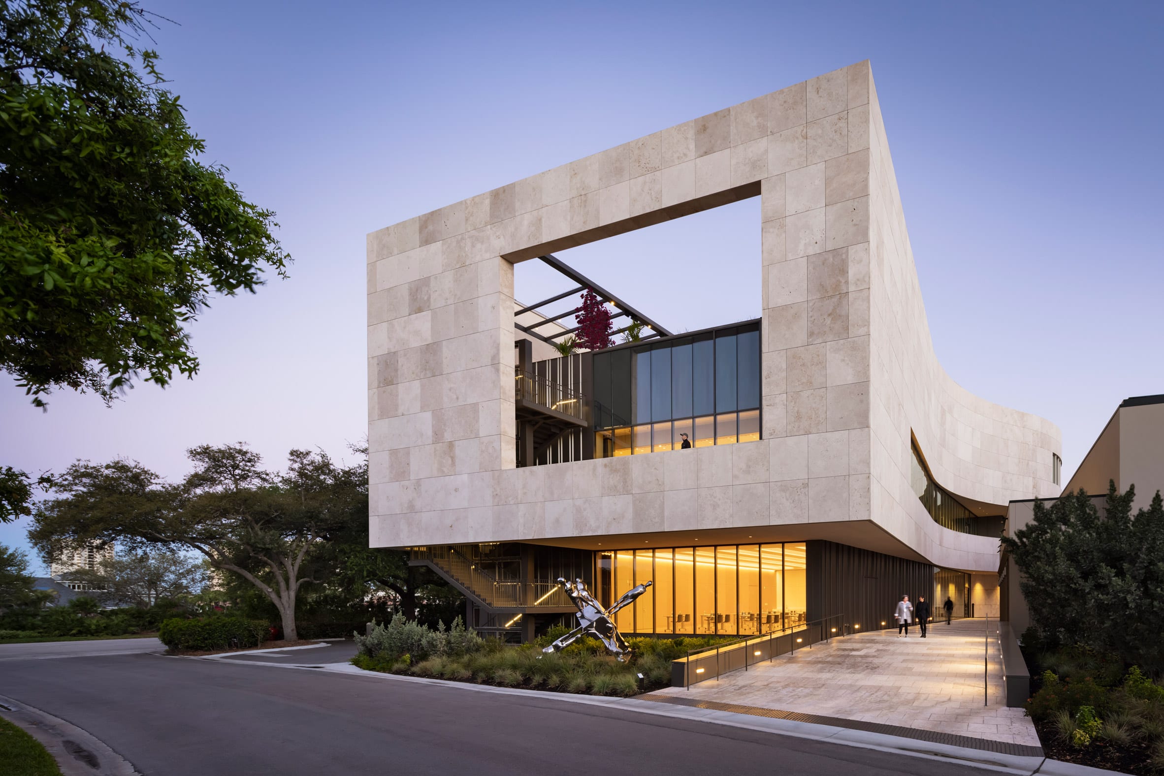Hurricane-resistant glazing and limestone facade of an art museum in Florida