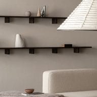 Wall shelves and white sofa