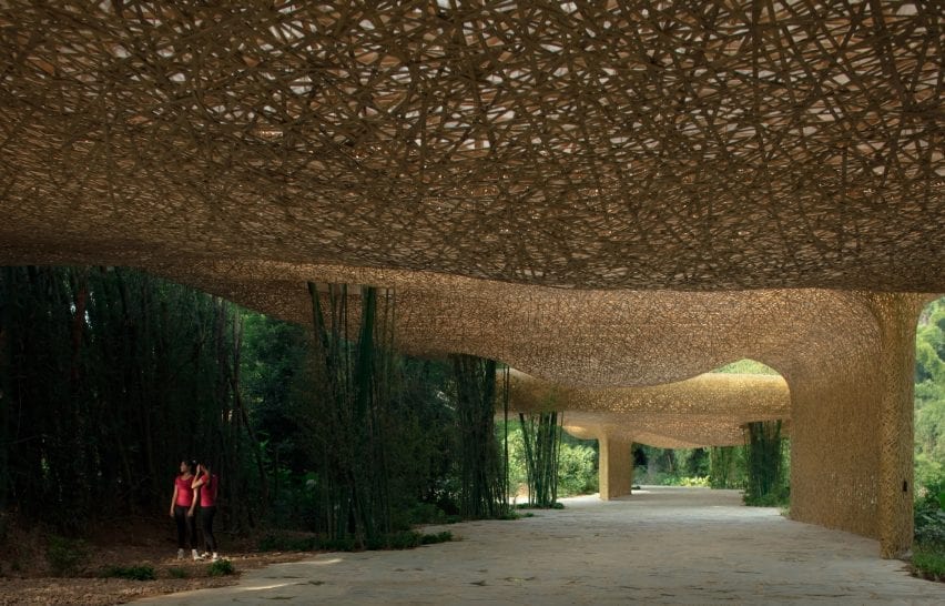 A walkway is formed beneath the pavilion by llLab.