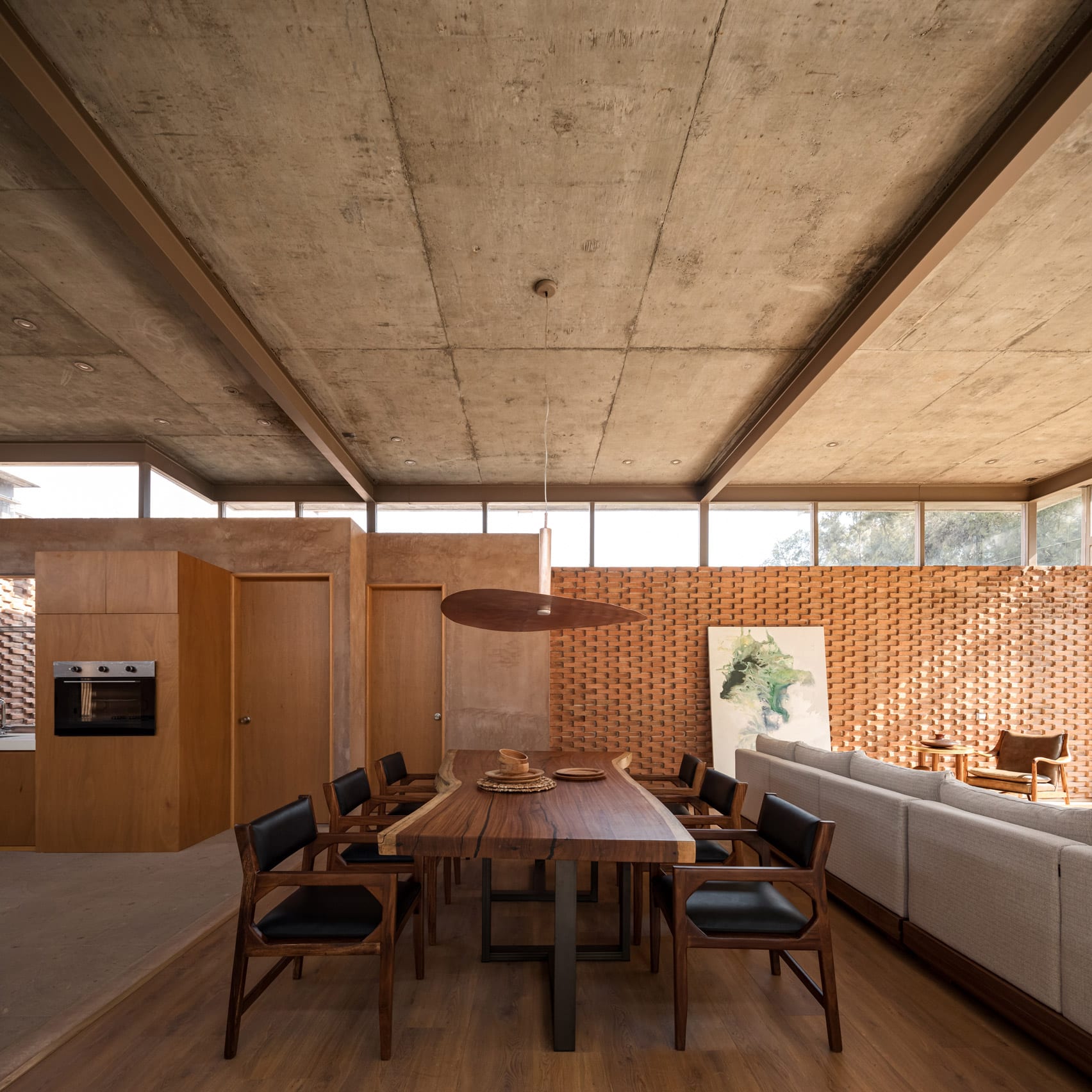 Wooden dining table of Casa UC in Mexico