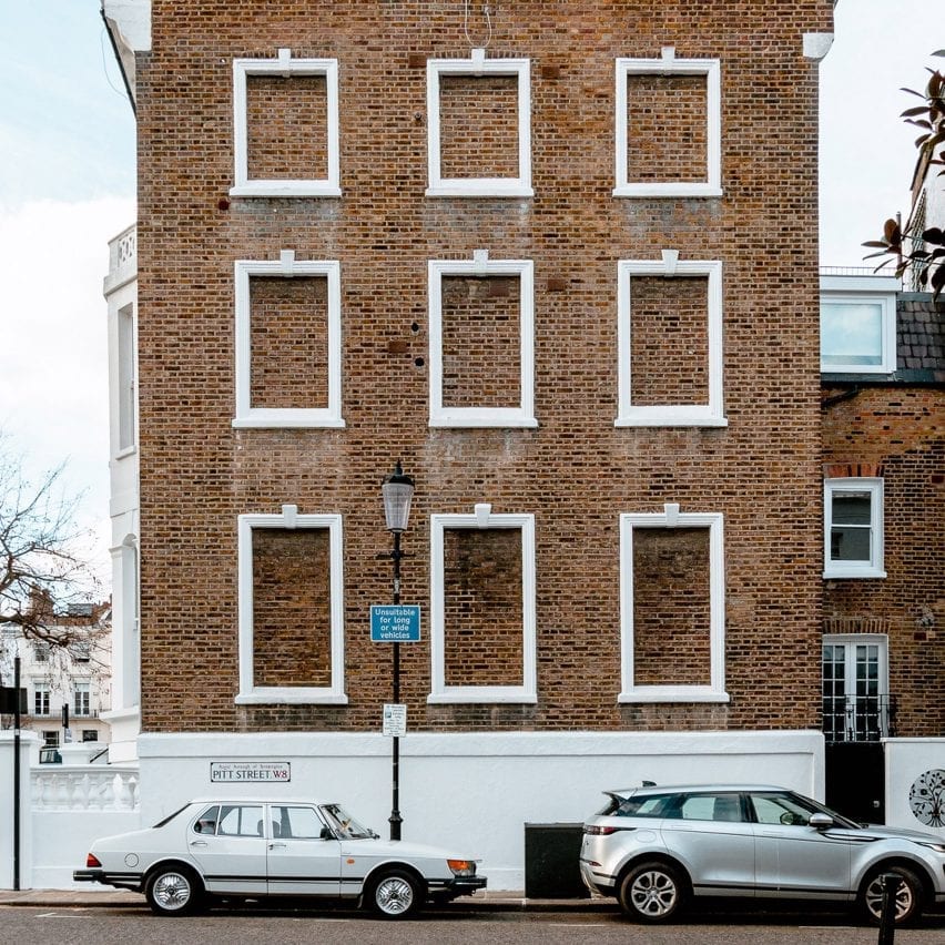 A facade with bricked-up windows in London