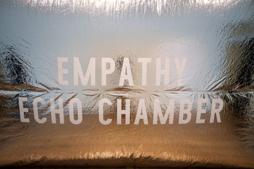 empathy echo chamber is printed on the side of the installation