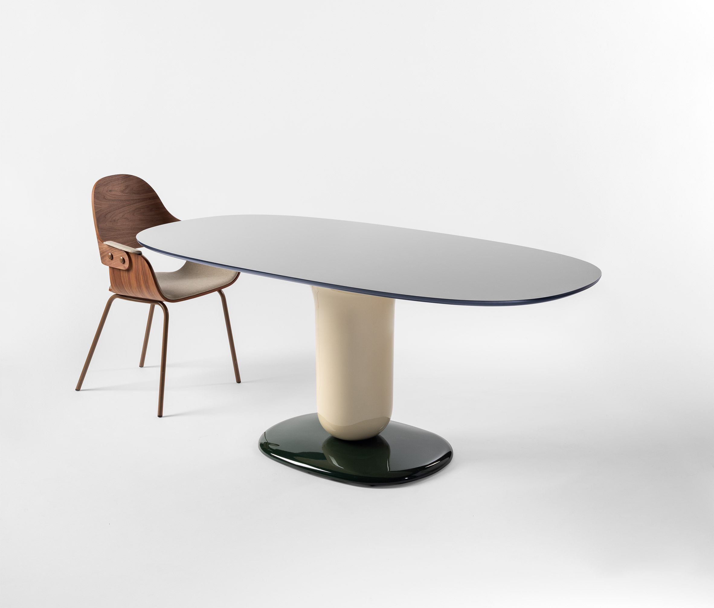 A pedestal dining table by Jaime Hayon