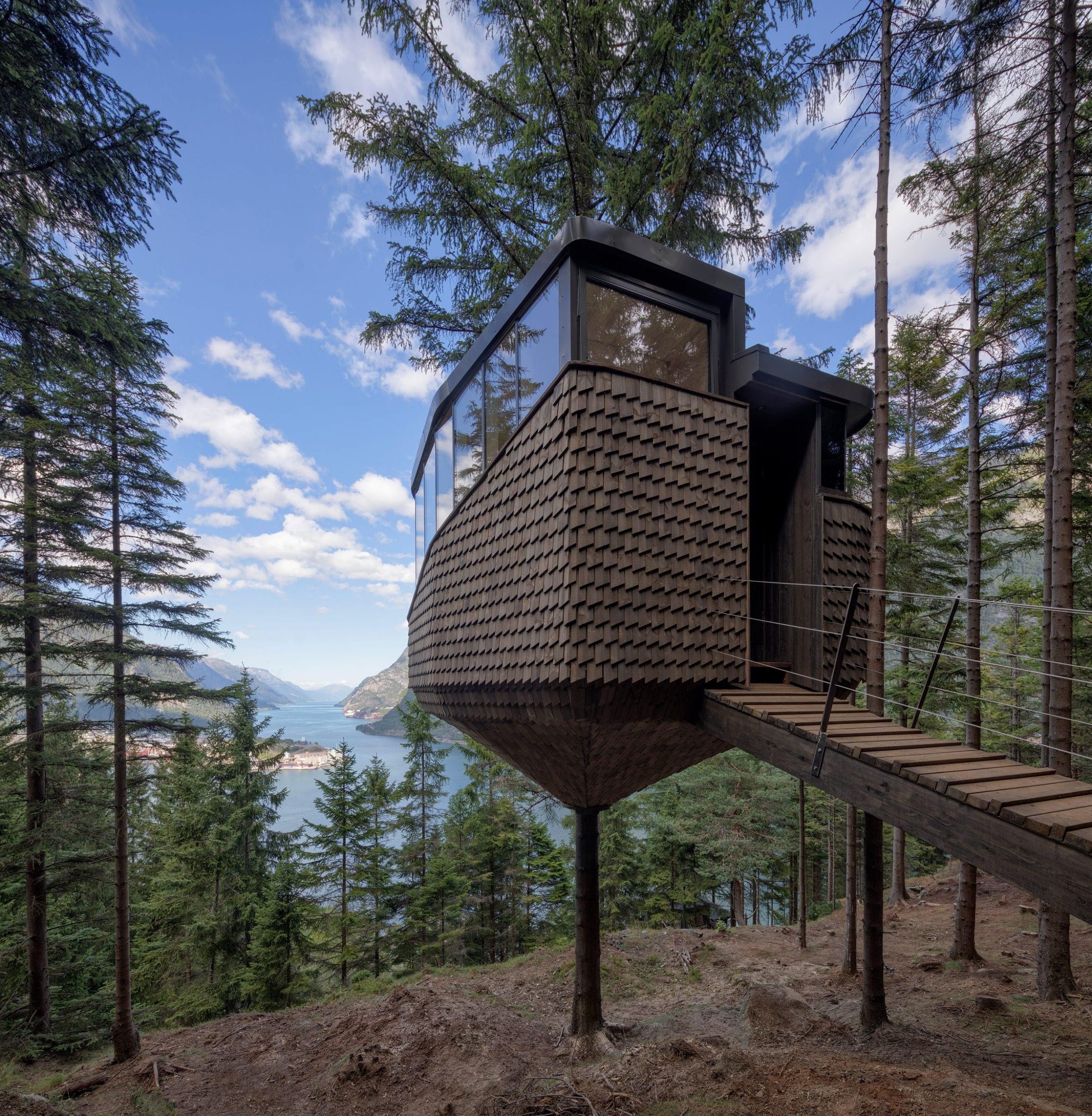 The woodnest treehouses overlook the fjord