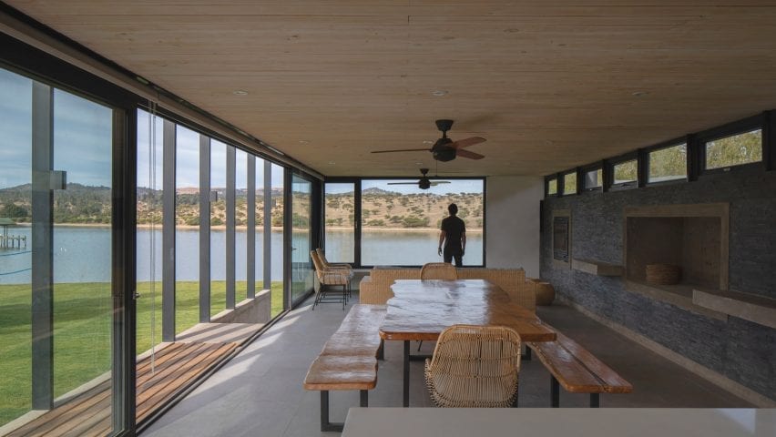 Dining room in holiday home overlooking lake