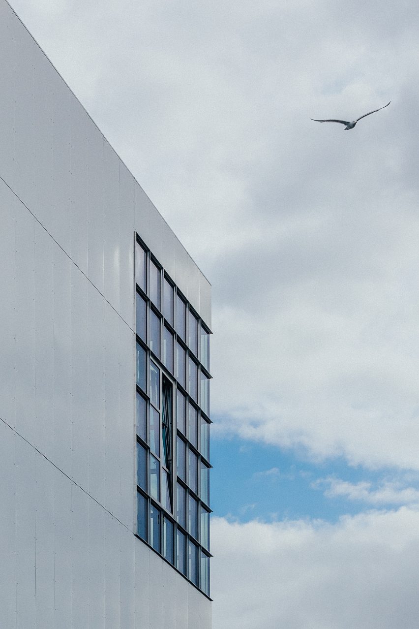 Large windows on aluminium-clad facade
