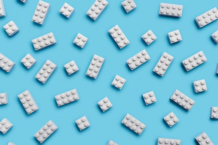 White Lego bricks on a blue surface