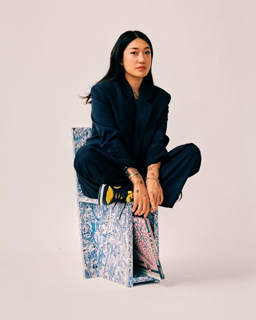 Peggy Gou on chair with vinyl storage designed with Space Available