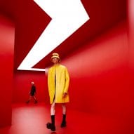 AMO designs red tunnel runway for Prada menswear show