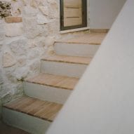 Tiles line the exterior staircase