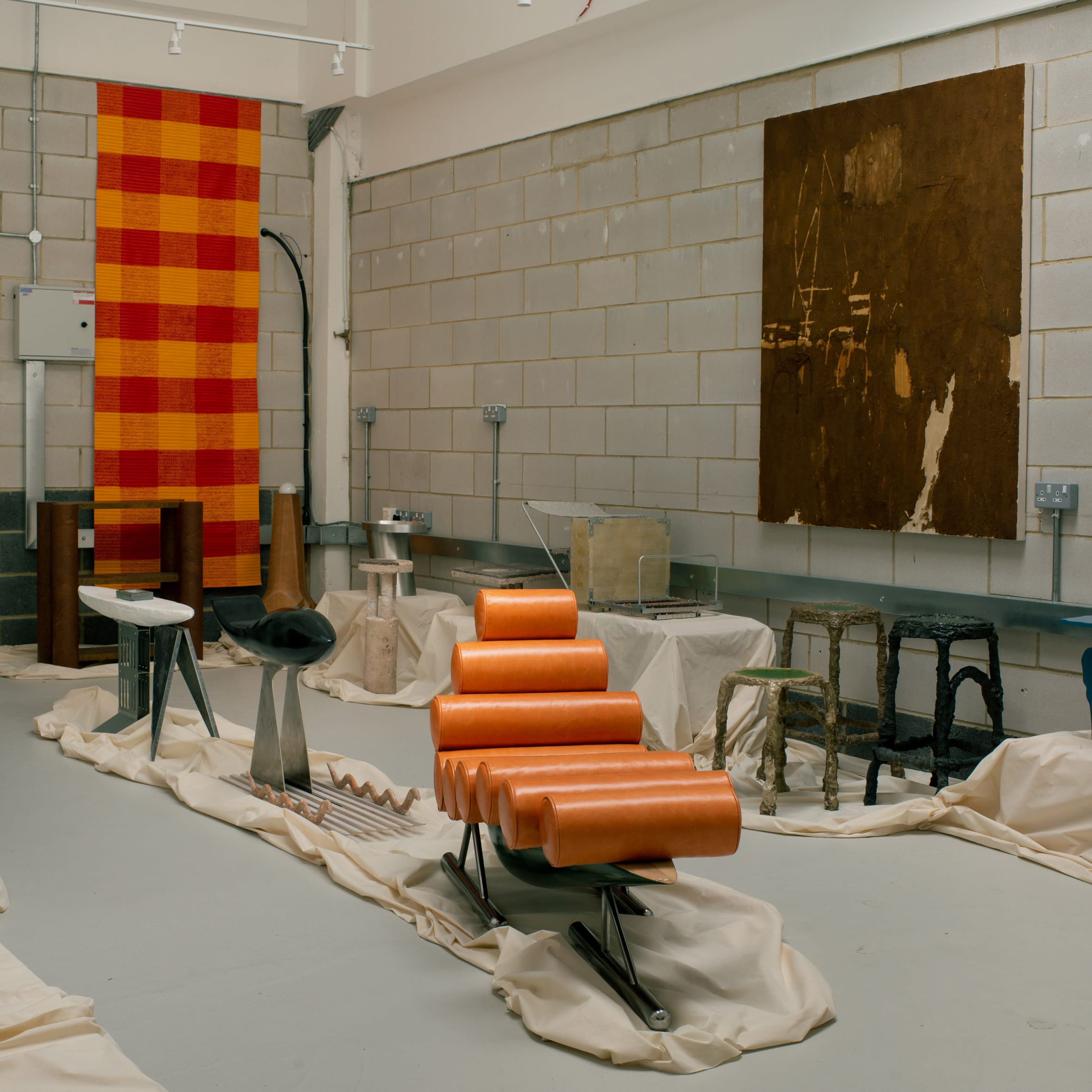 Furniture displayed in a studio space