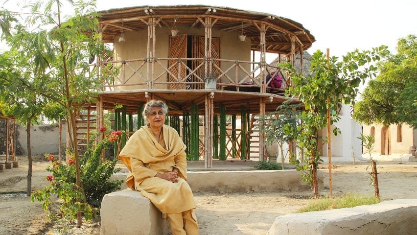 Yasmeen Lari in front of an earth and bamboo Women's Centre