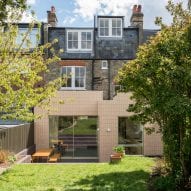 Pale pink tiles create distinctive new facade for London terrace renovated by Archmongers