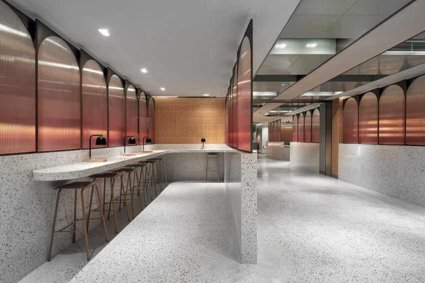 Canteen by SHH with terrazzo counter seating, terracotta tiles and ombre glass