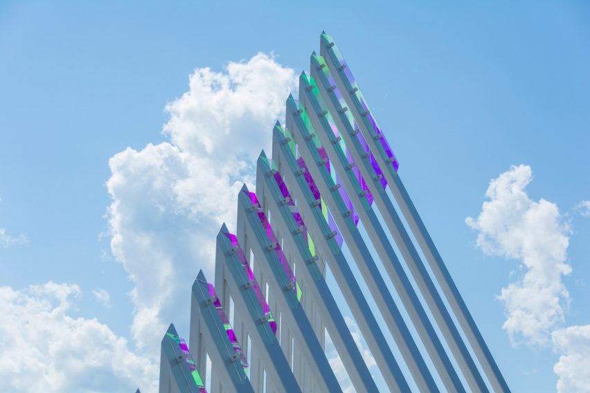 Glass fins refract colourful light during the day