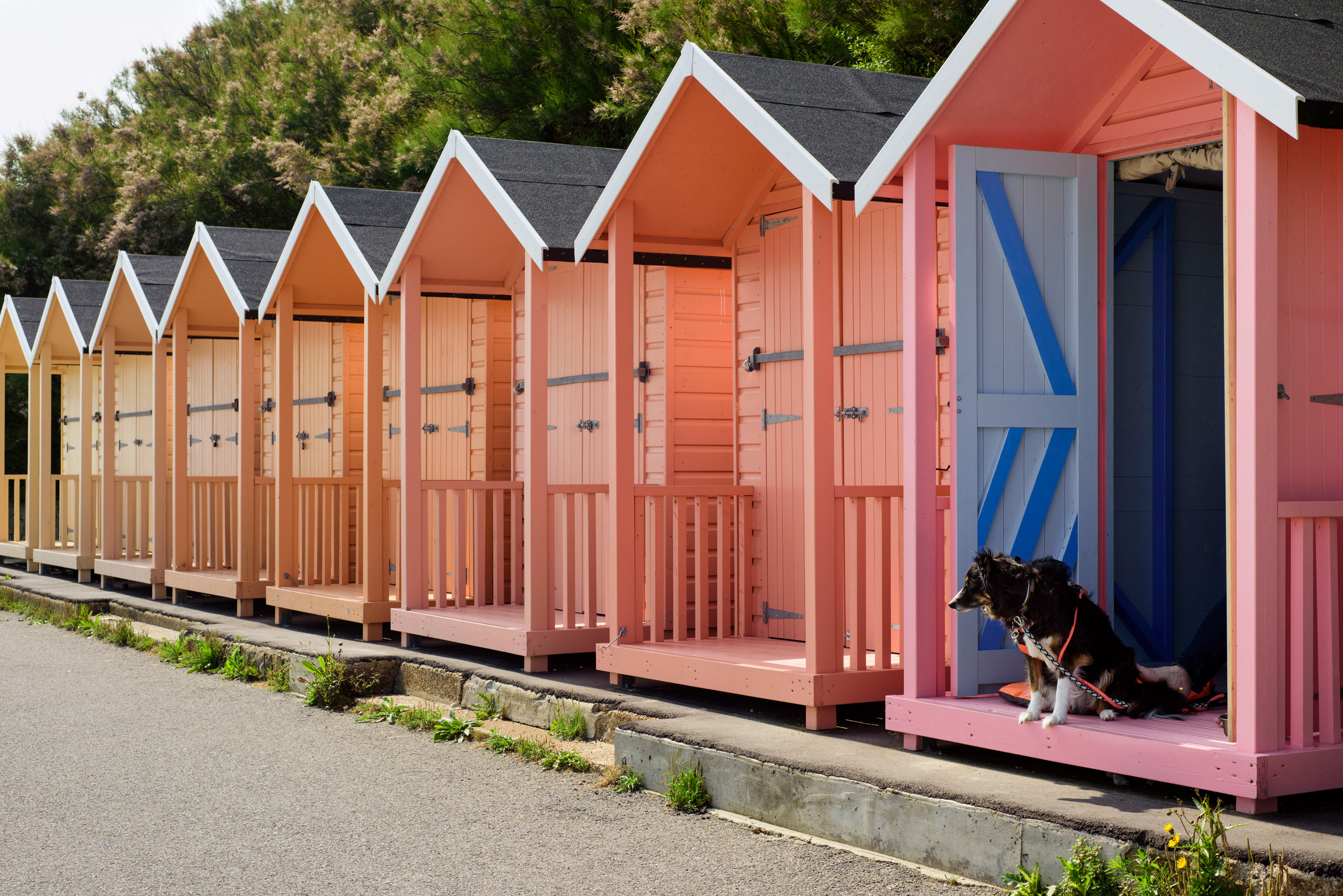 Beach huts in colourful yellow to pink gradient by Rana Begum