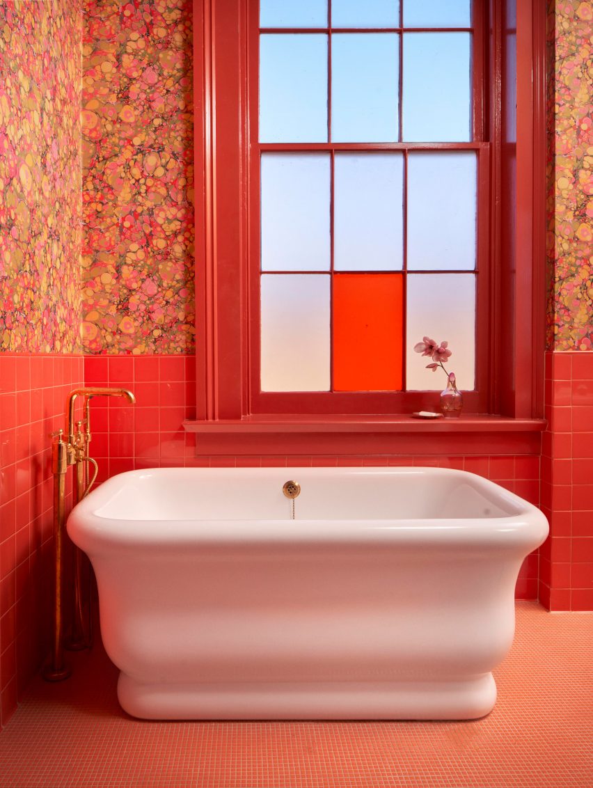 Bright red guest bathroom